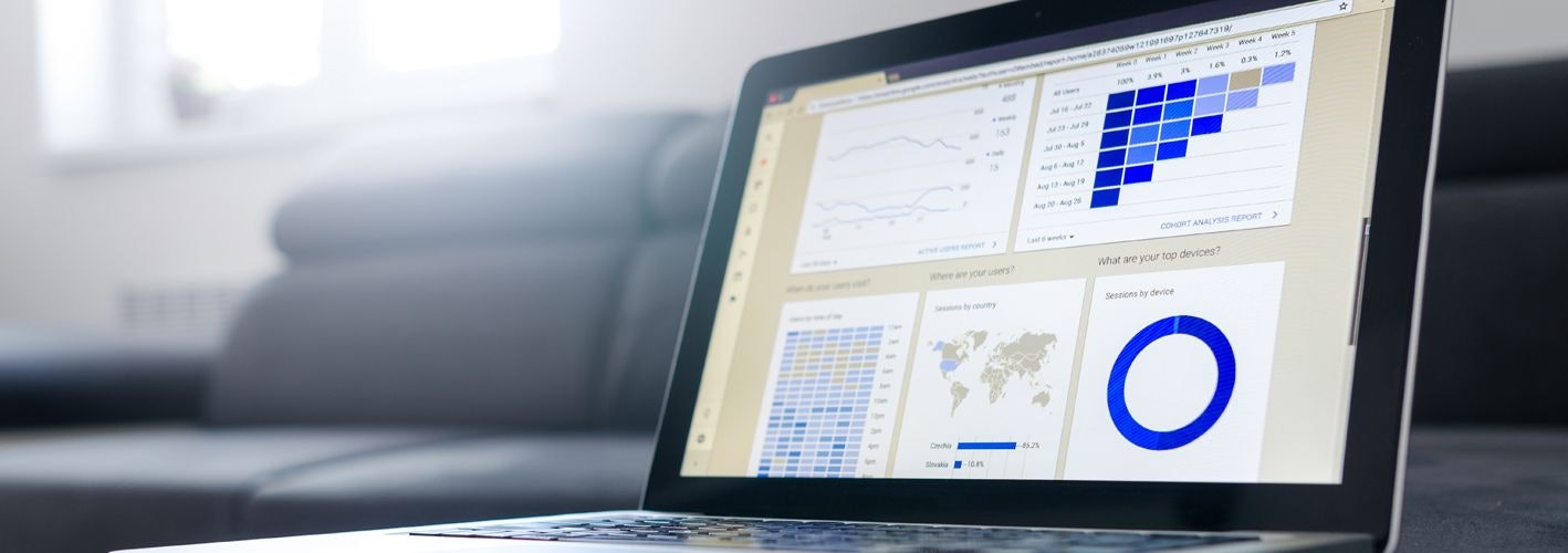 laptop with reporting dashboard